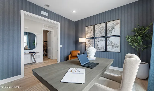 a living room with furniture and window