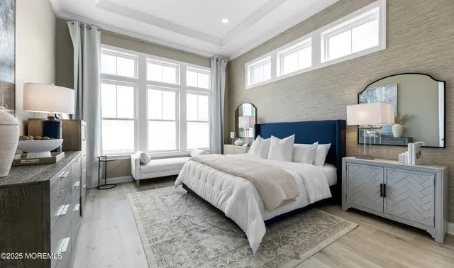 a bed room with a bed and a large window