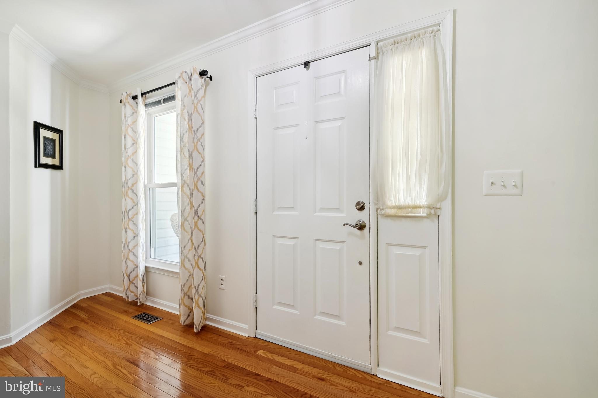 295 Locust Ridge Lane Arnold, MD 21012 - Photo 20 of 56 Welcoming Entry Foyer has Wood Flooring