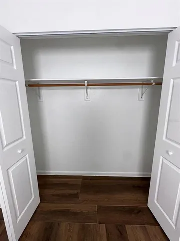 a view of small space with racks on the wall