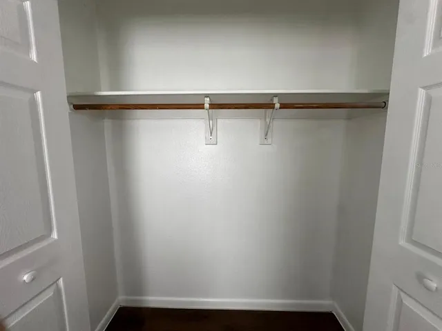 a view of small space with racks on the wall