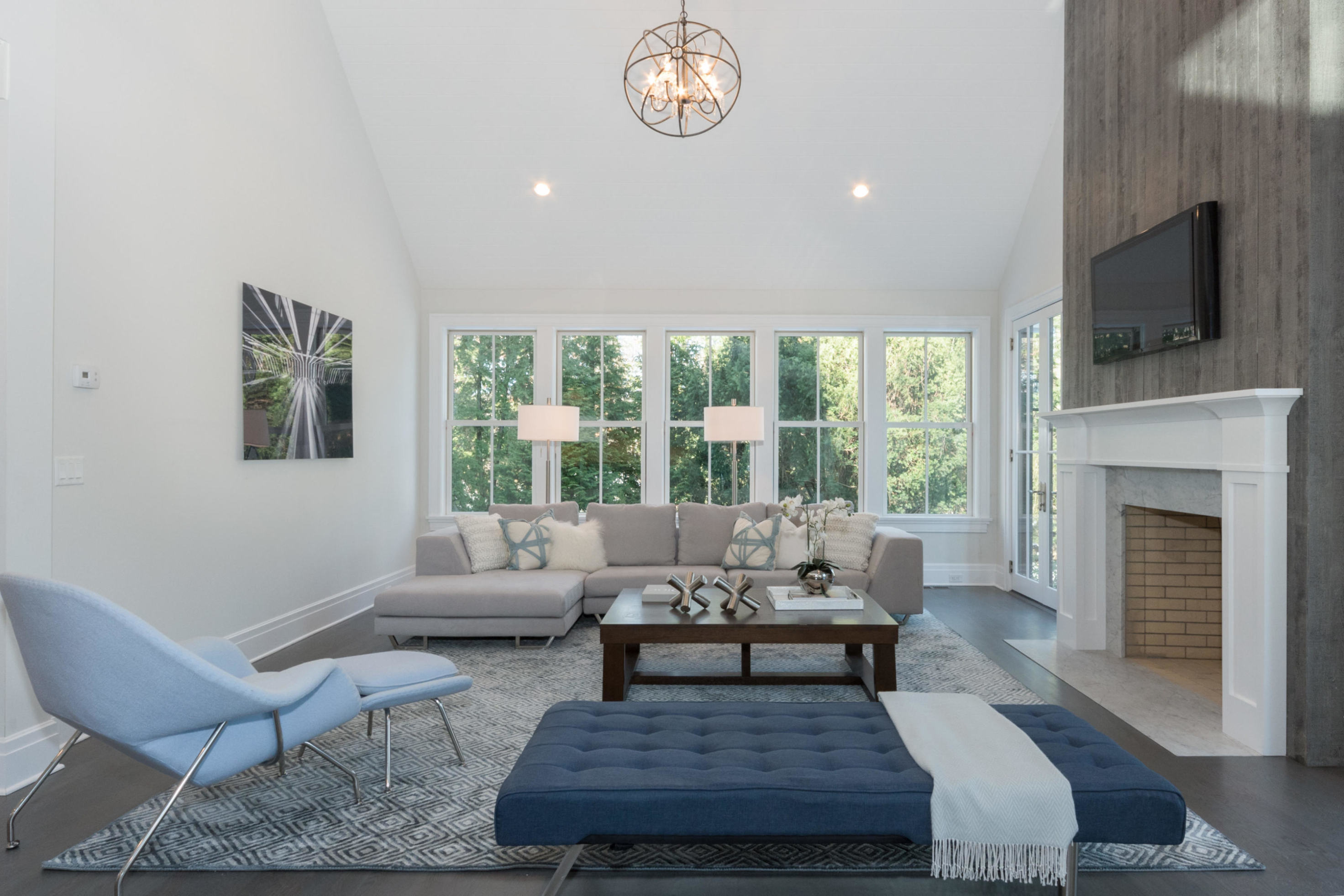 7 Revere Road Darien, CT 06820 - Photo 13 of 45 a living room with furniture a flat screen tv and a fireplace