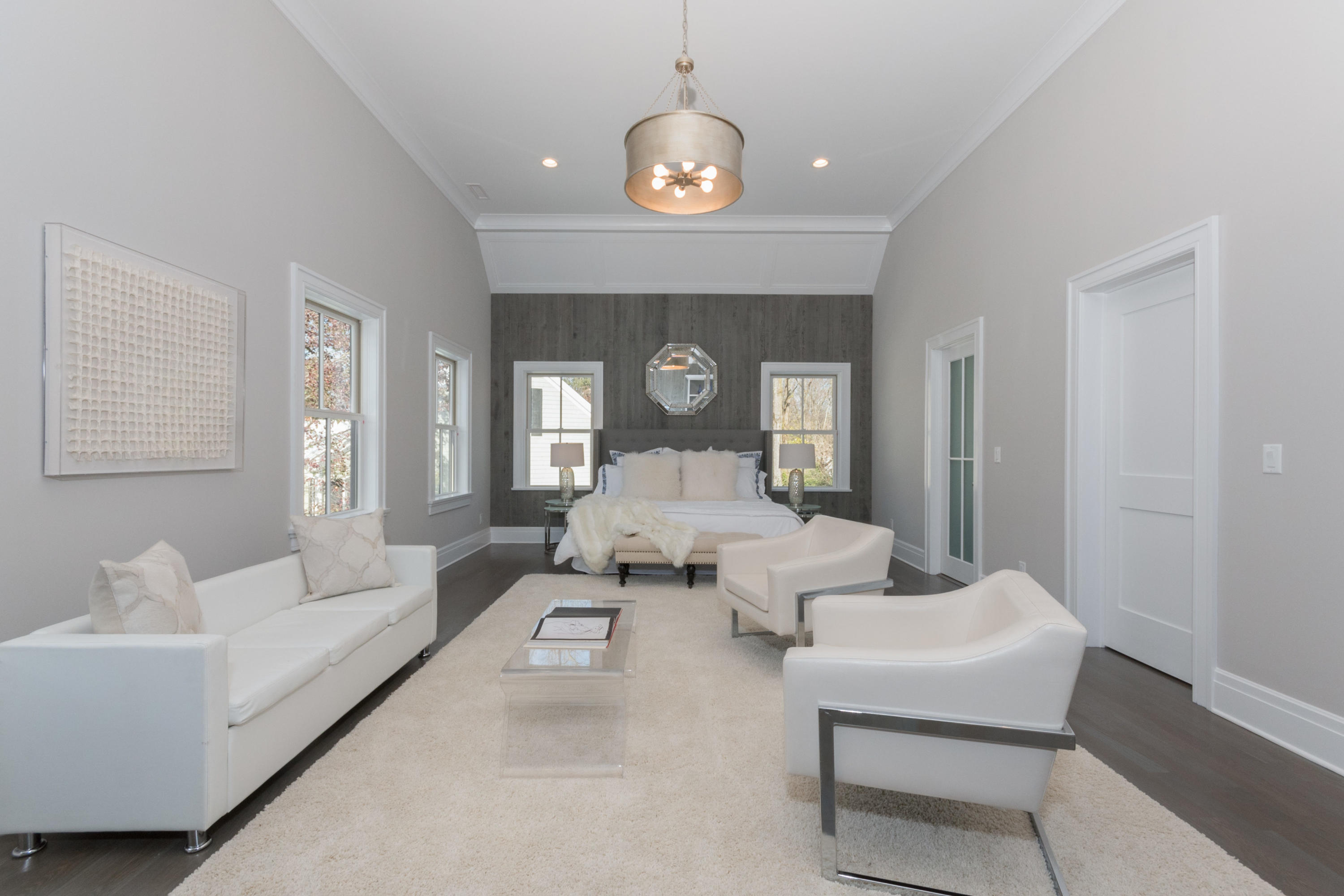 7 Revere Road Darien, CT 06820 - Photo 17 of 45 a living room with furniture and a chandelier