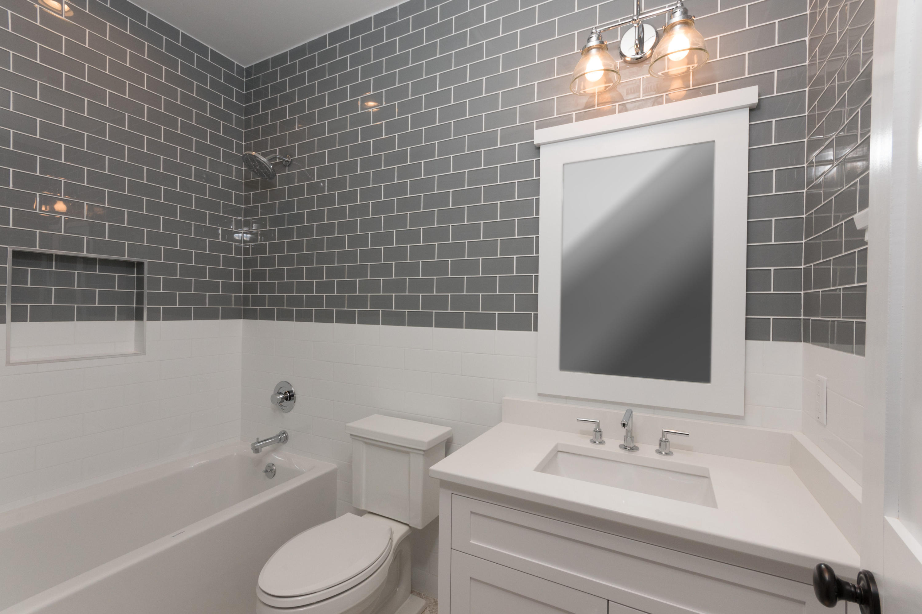 7 Revere Road Darien, CT 06820 - Photo 25 of 45 a bathroom with a toilet a sink and bathtub