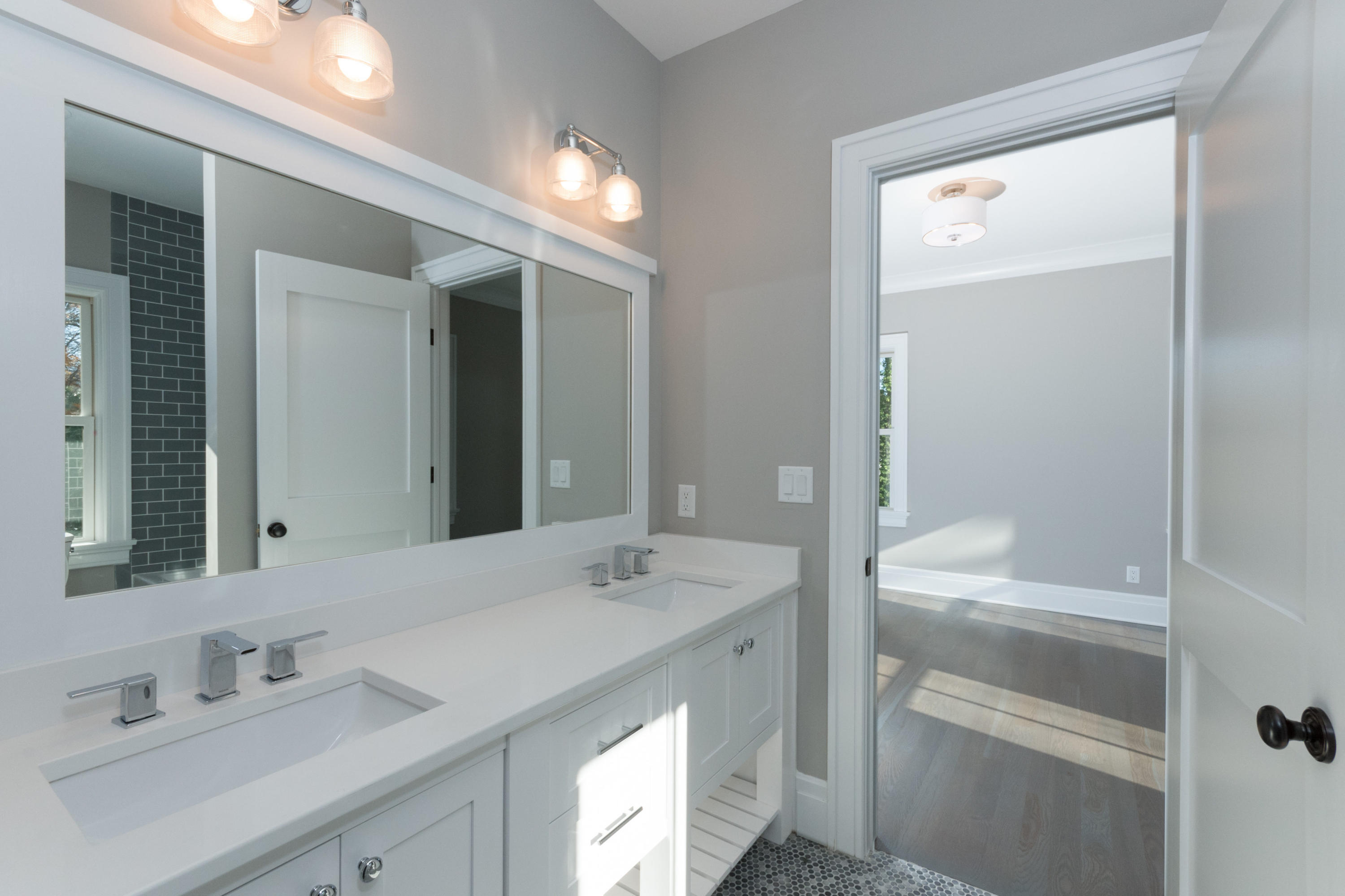 7 Revere Road Darien, CT 06820 - Photo 27 of 45 a bathroom with a sink and a mirror