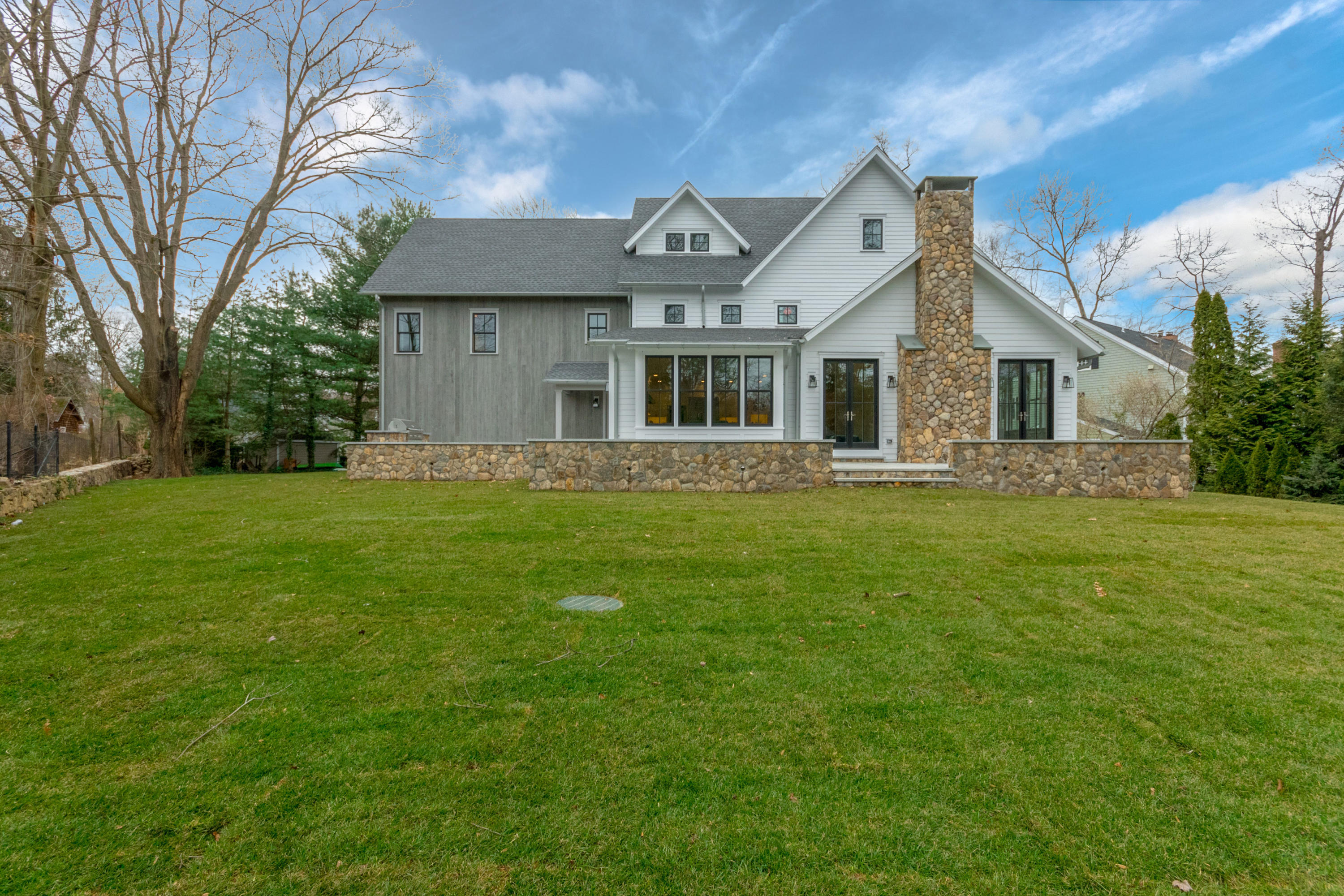 7 Revere Road Darien, CT 06820 - Photo 37 of 45 a front view of a house with a garden