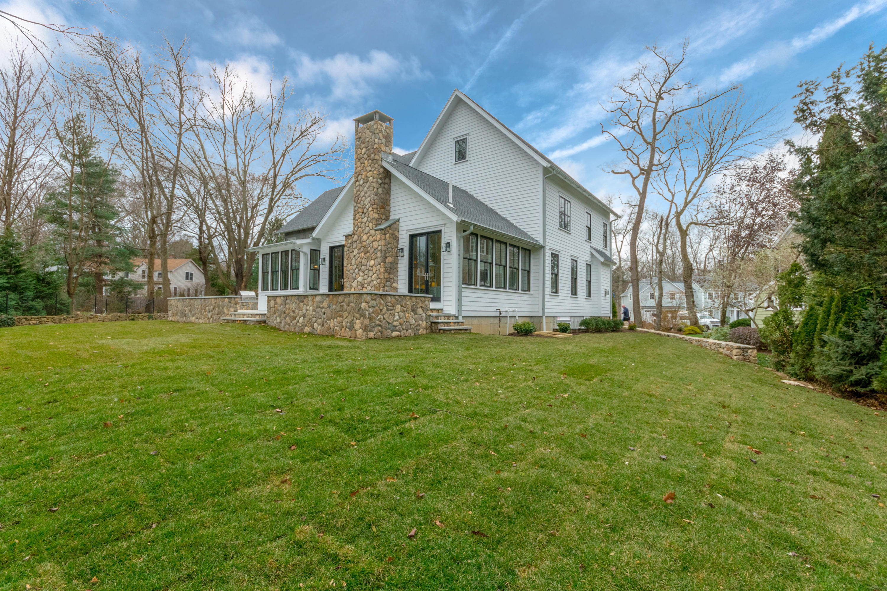 7 Revere Road Darien, CT 06820 - Photo 39 of 45 a front view of house with yard and green space