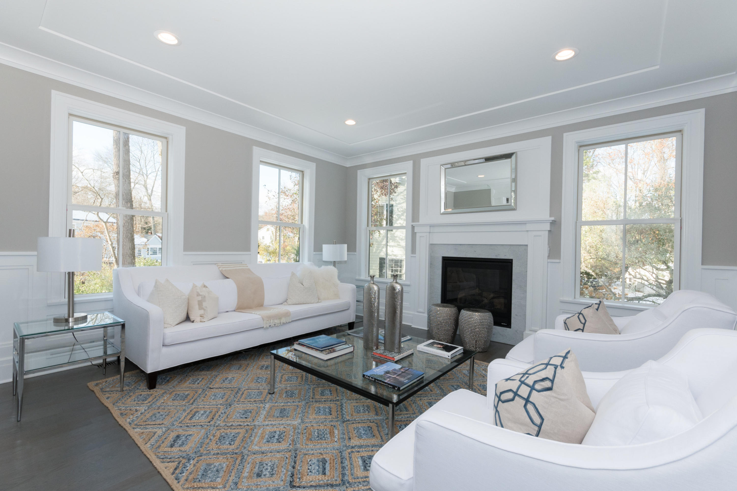 7 Revere Road Darien, CT 06820 - Photo 4 of 45 a living room with furniture and a fireplace