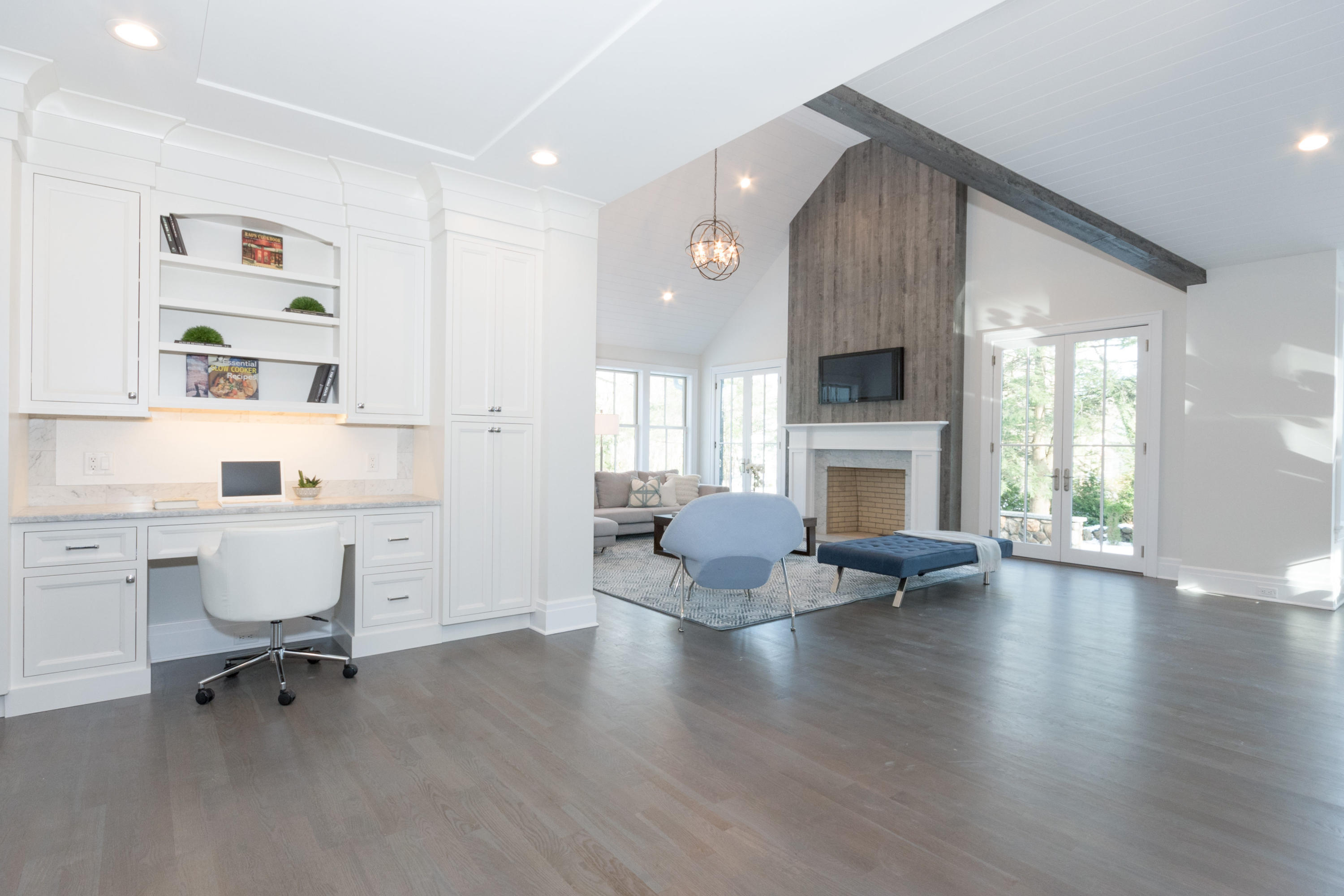 7 Revere Road Darien, CT 06820 - Photo 9 of 45 a living room with fireplace furniture and a wooden floor