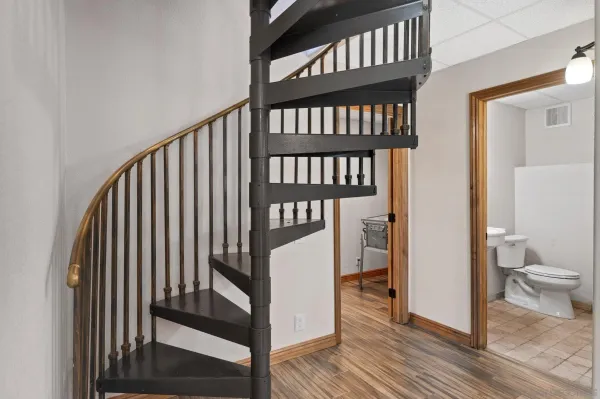 a room with furniture and wooden floor