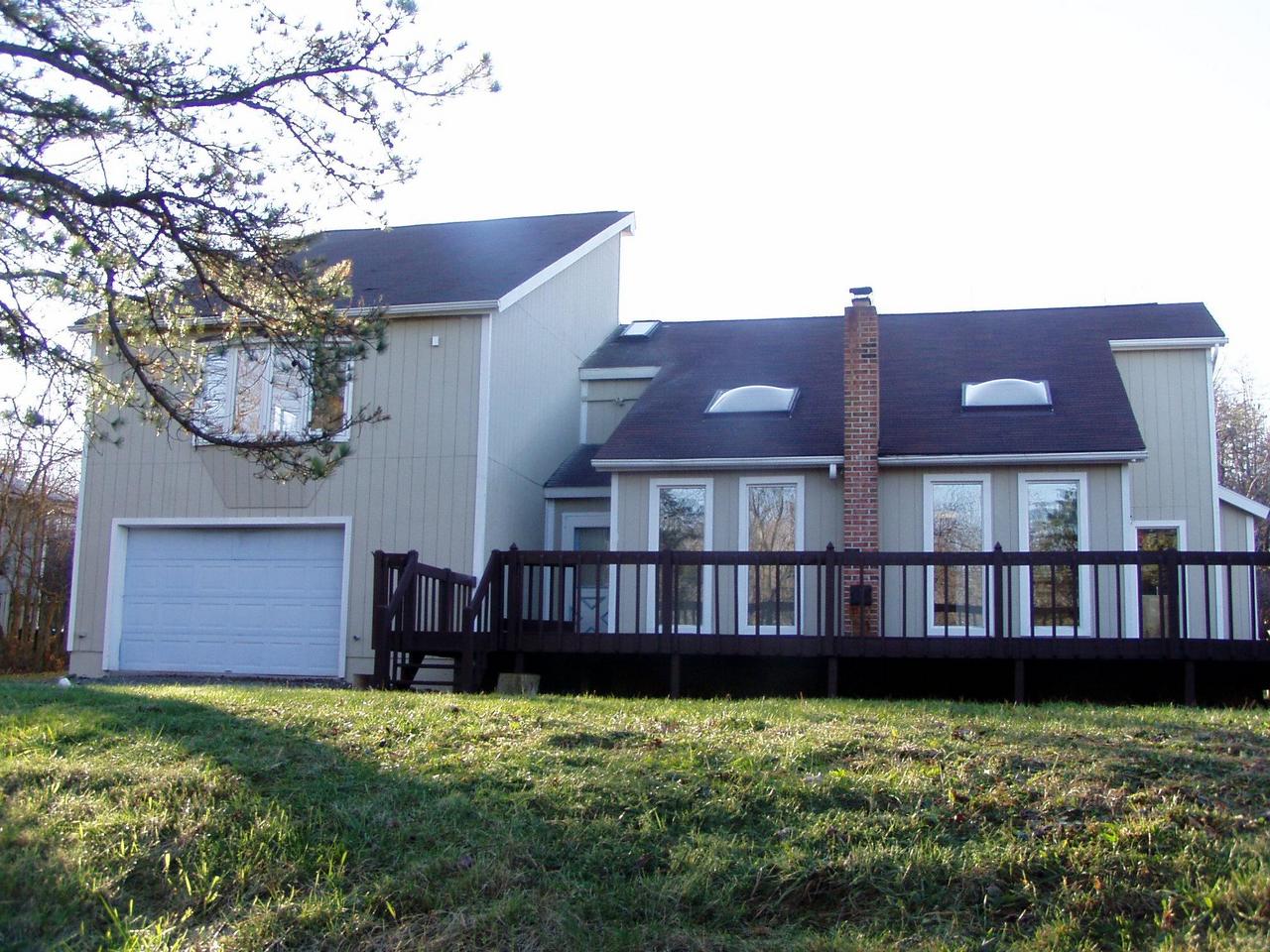 5547 Granite Road Long Pond, PA 18334 - Photo 1 of 1 a house view with a garden space