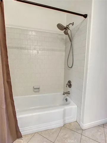 a bathroom with a bath tub