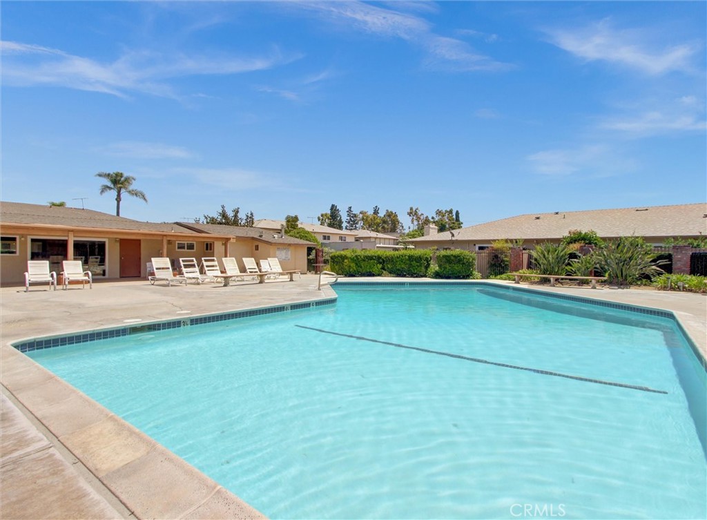 1881 Mitchell Avenue, Unit 63 Tustin, CA 92780 - Photo 23 of 24 a front view of a house with a yard