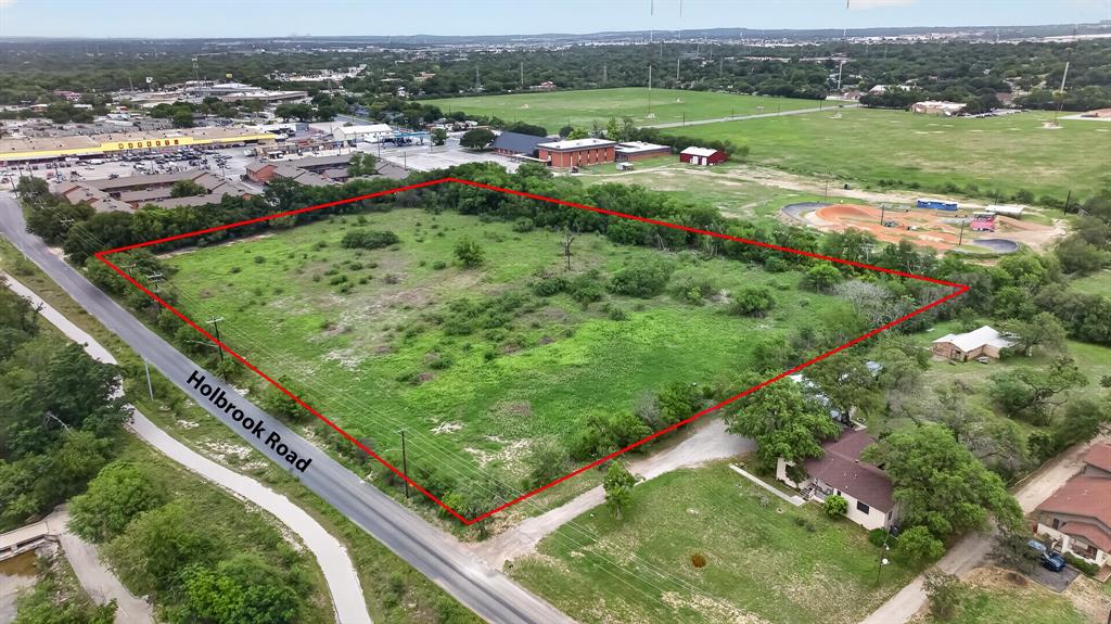 1328 Holbrook Road San Antonio, TX 78218 - Photo 3 of 21 an aerial view of huge green field with lots of green plants in it