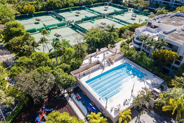 an aerial view of residential house with outdoor space and swimming pool