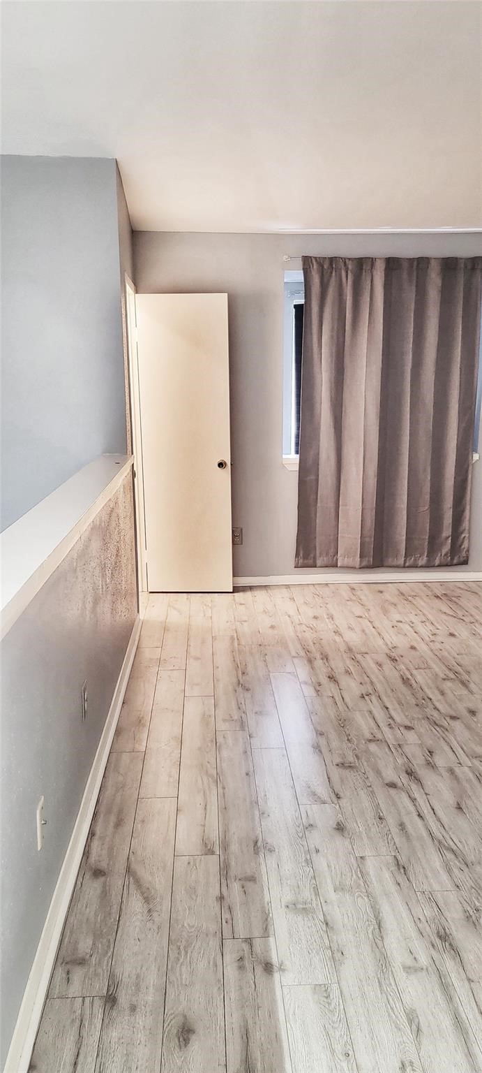 2110 Wilcrest Drive, Unit 113 Houston, TX 77077 - Photo 10 of 22 a view of wooden floor