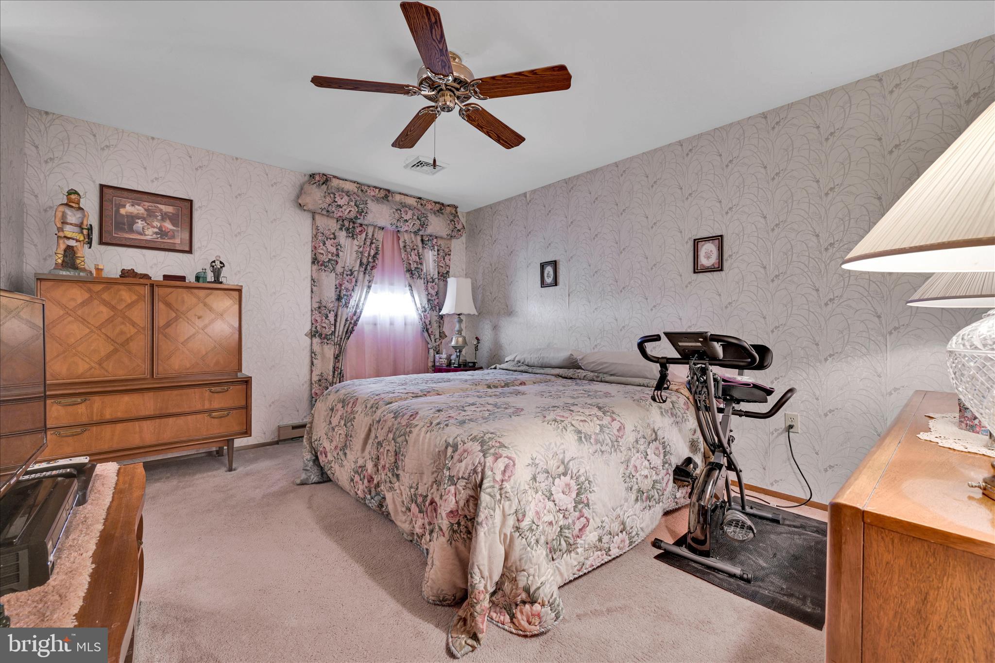 649 Stone Hill Road Shoemakersville, PA 19555 - Photo 23 of 43 a bedroom with a bed and ceiling fan