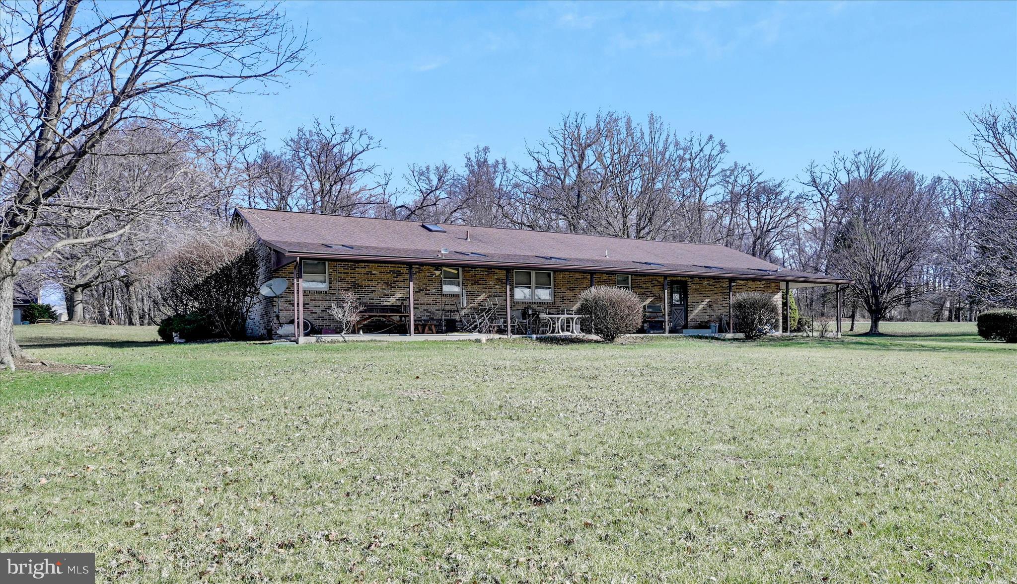 649 Stone Hill Road Shoemakersville, PA 19555 - Photo 37 of 43 a front view of a house with garden