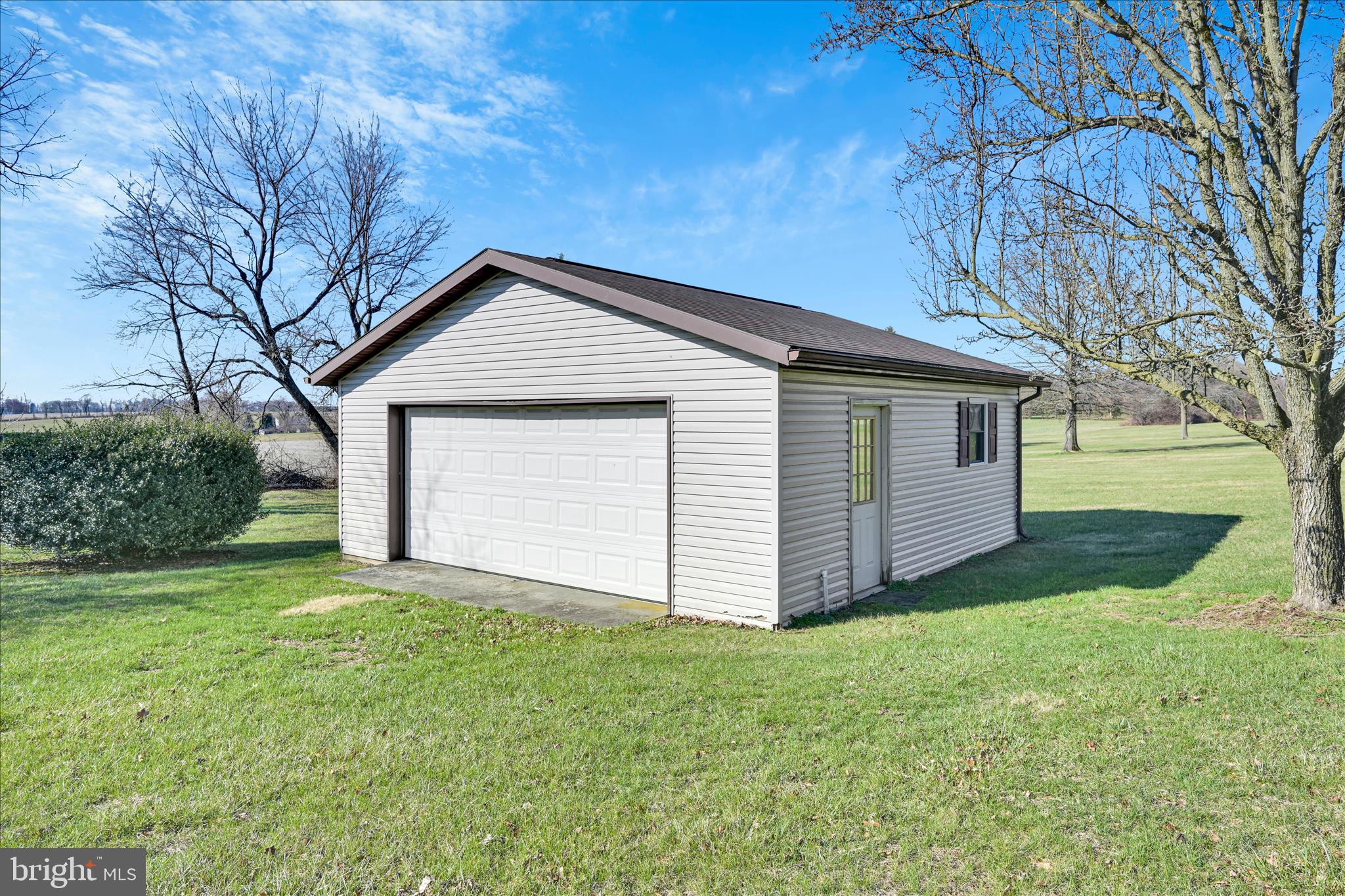 649 Stone Hill Road Shoemakersville, PA 19555 - Photo 40 of 43 a front view of house with yard and trees in the background