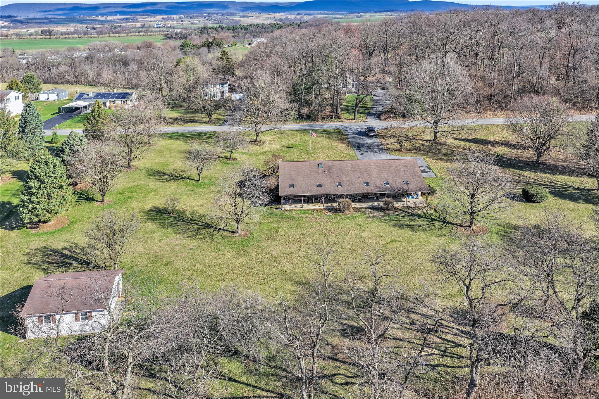 649 Stone Hill Road Shoemakersville, PA 19555 - Photo 5 of 43 a view of a yard with wooden fence