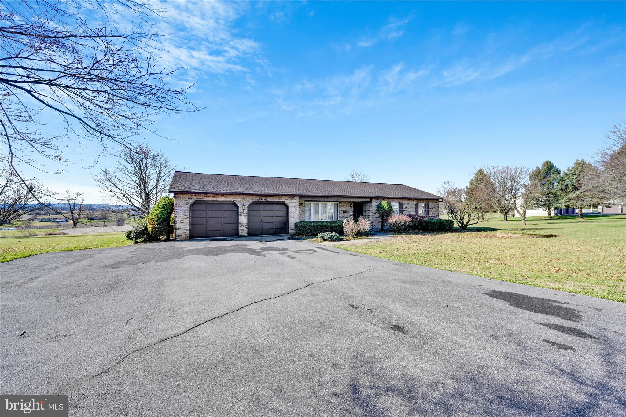 649 Stone Hill Road Shoemakersville, PA 19555 - Photo 8 of 43 a front view of a house with a yard and swimming pool