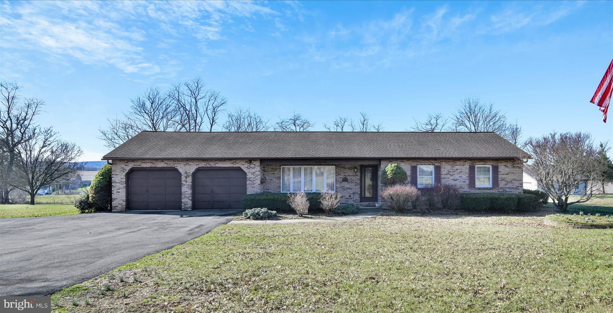 649 Stone Hill Road Shoemakersville, PA 19555 - Photo 9 of 43 a front view of a house with a yard and garage
