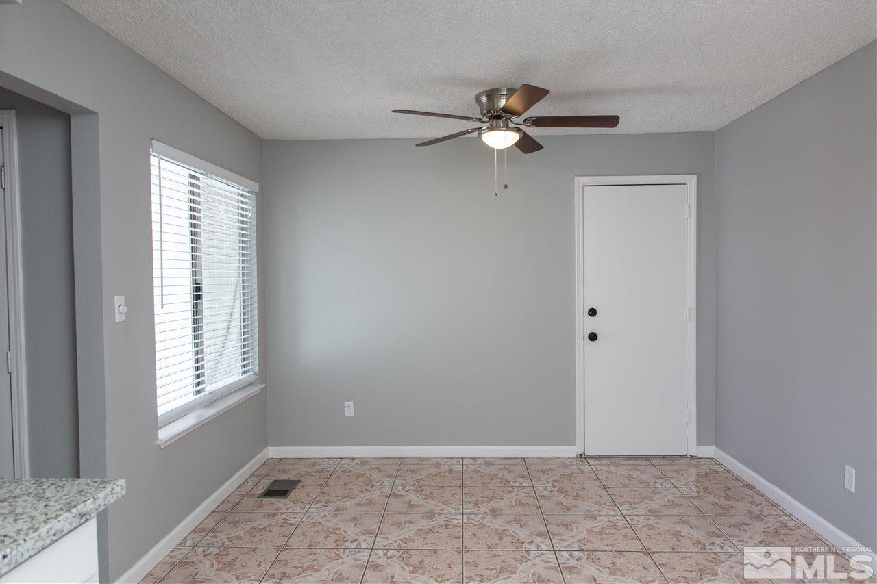 6545 Lotus Street Reno, NV 89506 - Photo 11 of 28 a view of an empty room with a window