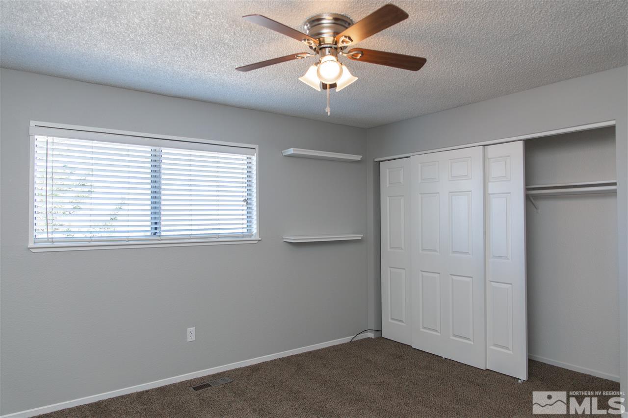 6545 Lotus Street Reno, NV 89506 - Photo 16 of 28 a view of an empty room with a window