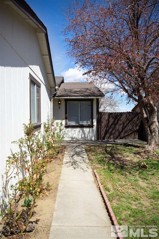 6545 Lotus Street Reno, NV 89506 - Photo 27 of 28 a view of a house with a yard