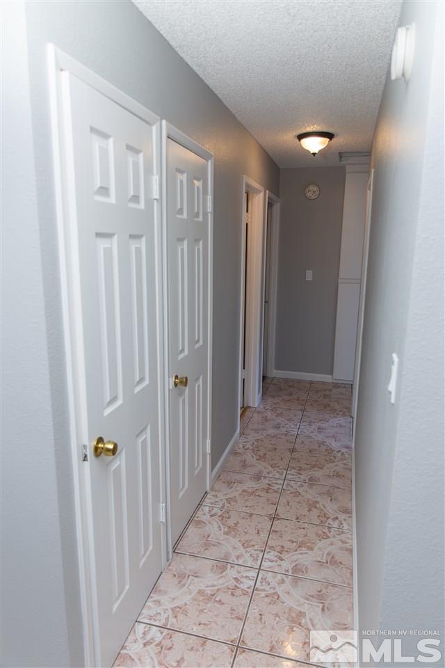 6545 Lotus Street Reno, NV 89506 - Photo 7 of 28 a view of a hallway