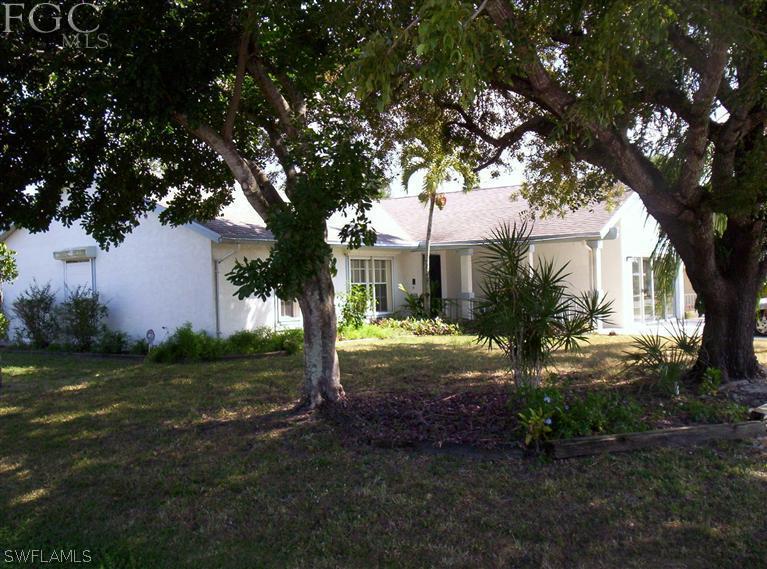 18567 Evergreen Road Fort Myers, FL 33967 - Photo 2 of 12 a view of backyard with green space