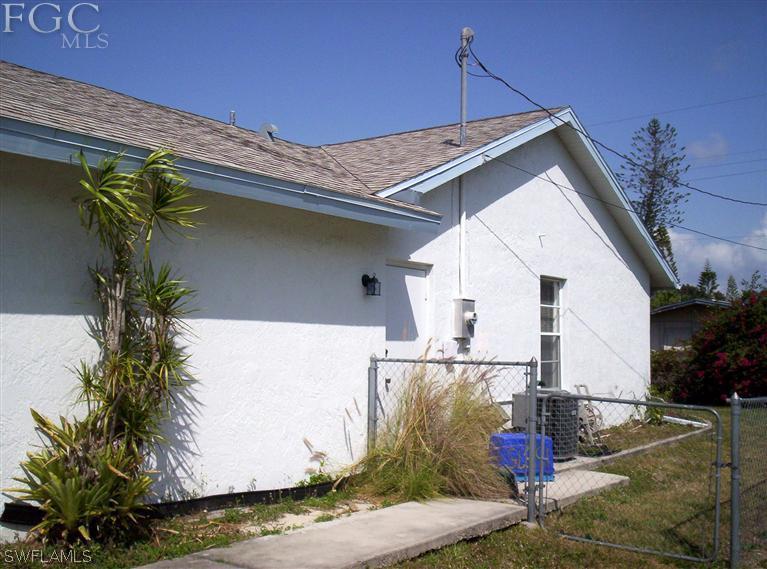 18567 Evergreen Road Fort Myers, FL 33967 - Photo 3 of 12 a view of a house with a potted plant