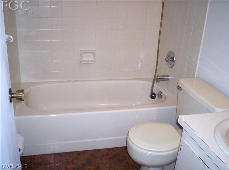 18567 Evergreen Road Fort Myers, FL 33967 - Photo 10 of 12 a bathroom with a sink a toilet and bathtub