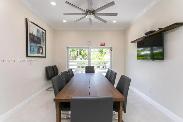 a view of a dining room with furniture