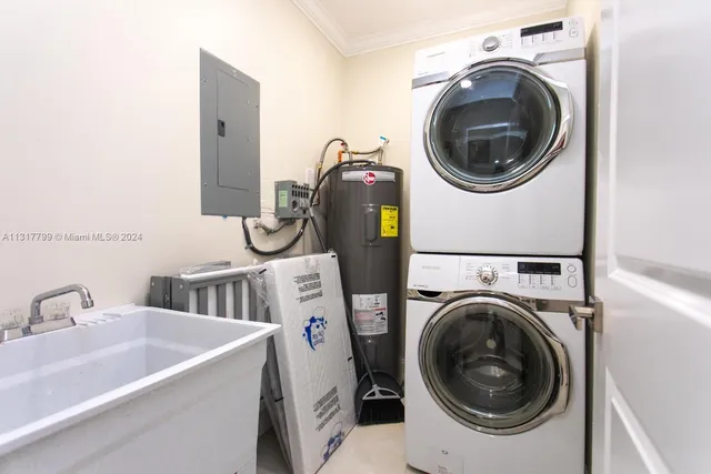 a utility room with dryer and washer