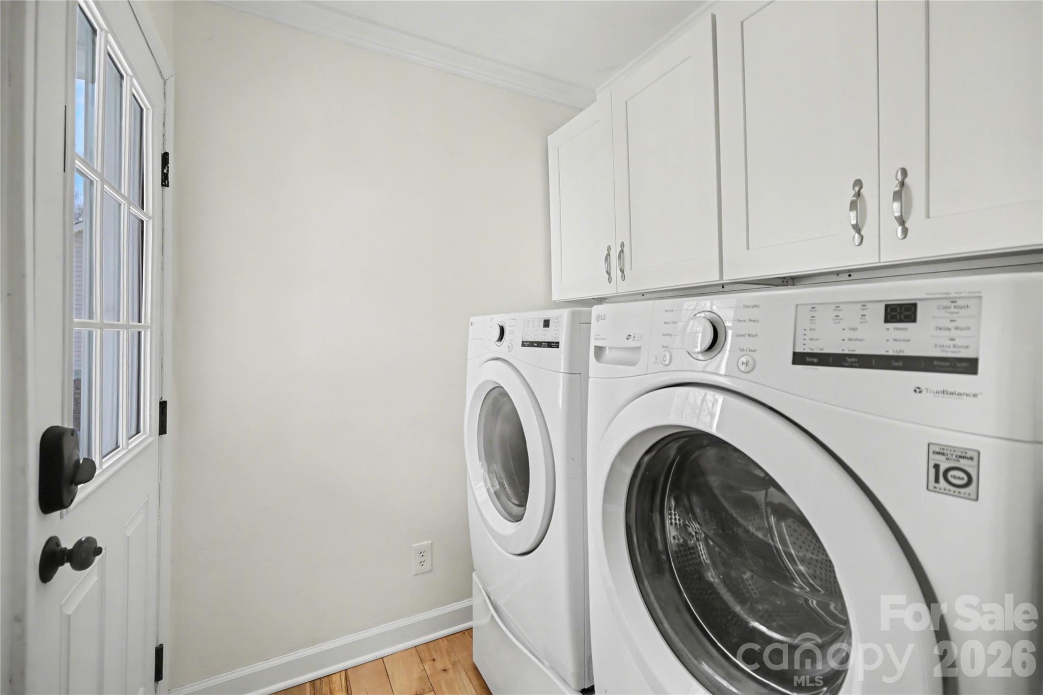 8330 Tifton Road Charlotte, NC 28226 - Photo 16 of 36 a utility room with dryer and washer