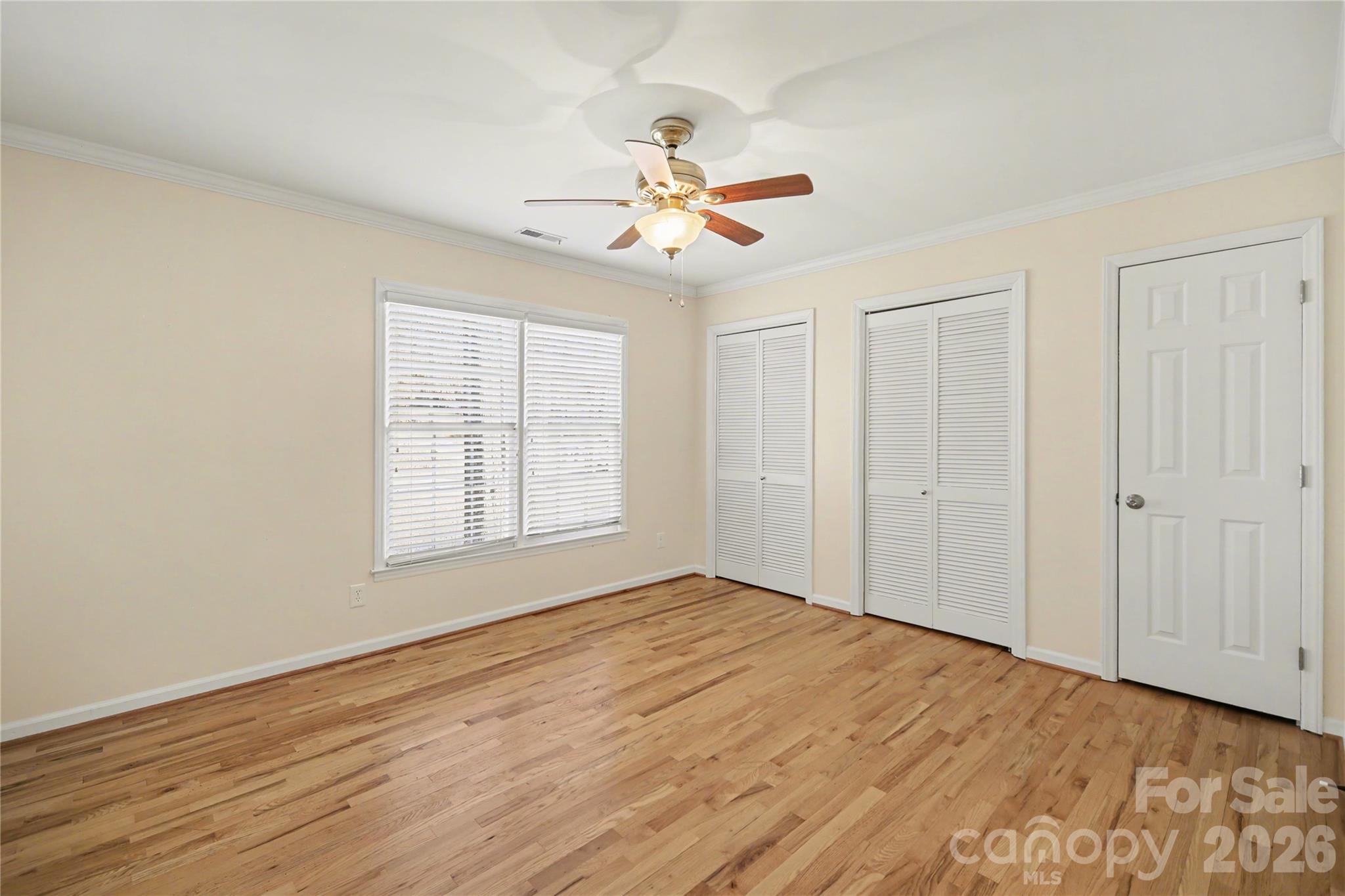 8330 Tifton Road Charlotte, NC 28226 - Photo 27 of 36 wooden floor in an empty room with a window