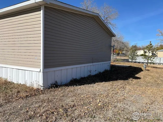 a view of a back yard of the house