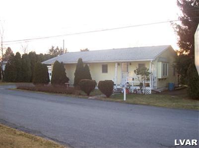 6023 Short Road Nazareth, PA 18064 - Photo 1 of 10 a view of a house with backyard porch and sitting area