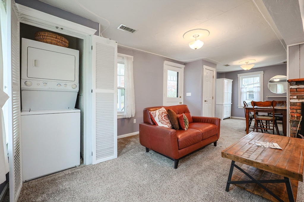 4 Roosevelt Street Wareham, MA 02571 - Photo 15 of 34 a living room with furniture and a table