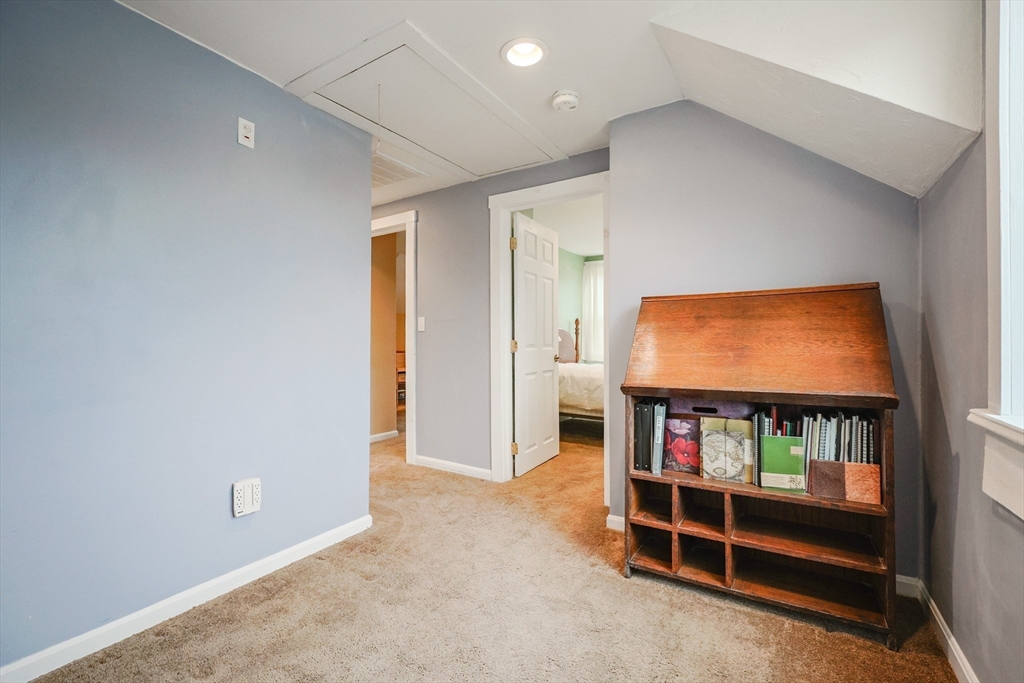 4 Roosevelt Street Wareham, MA 02571 - Photo 17 of 34 an empty room with bookshelf and a window