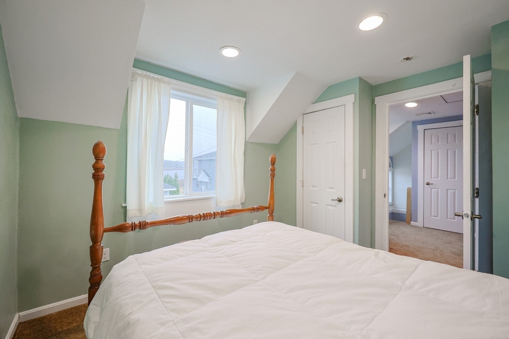 4 Roosevelt Street Wareham, MA 02571 - Photo 18 of 34 a bedroom with a bed and a window