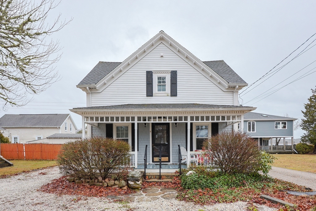 4 Roosevelt Street Wareham, MA 02571 - Photo 2 of 34 front view of a house with a garden