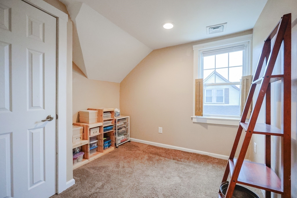 4 Roosevelt Street Wareham, MA 02571 - Photo 21 of 34 a view of room with window and wooden floor