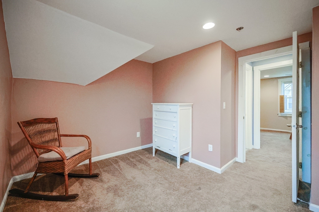 4 Roosevelt Street Wareham, MA 02571 - Photo 26 of 34 a view of a livingroom with furniture and a chair