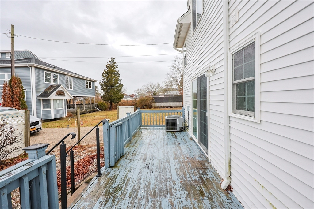 4 Roosevelt Street Wareham, MA 02571 - Photo 28 of 34 a view of a balcony with wooden floor