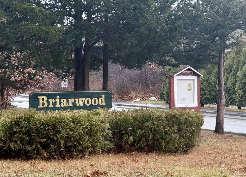 4 Roosevelt Street Wareham, MA 02571 - Photo 32 of 34 a sign that is sitting in front of a tree