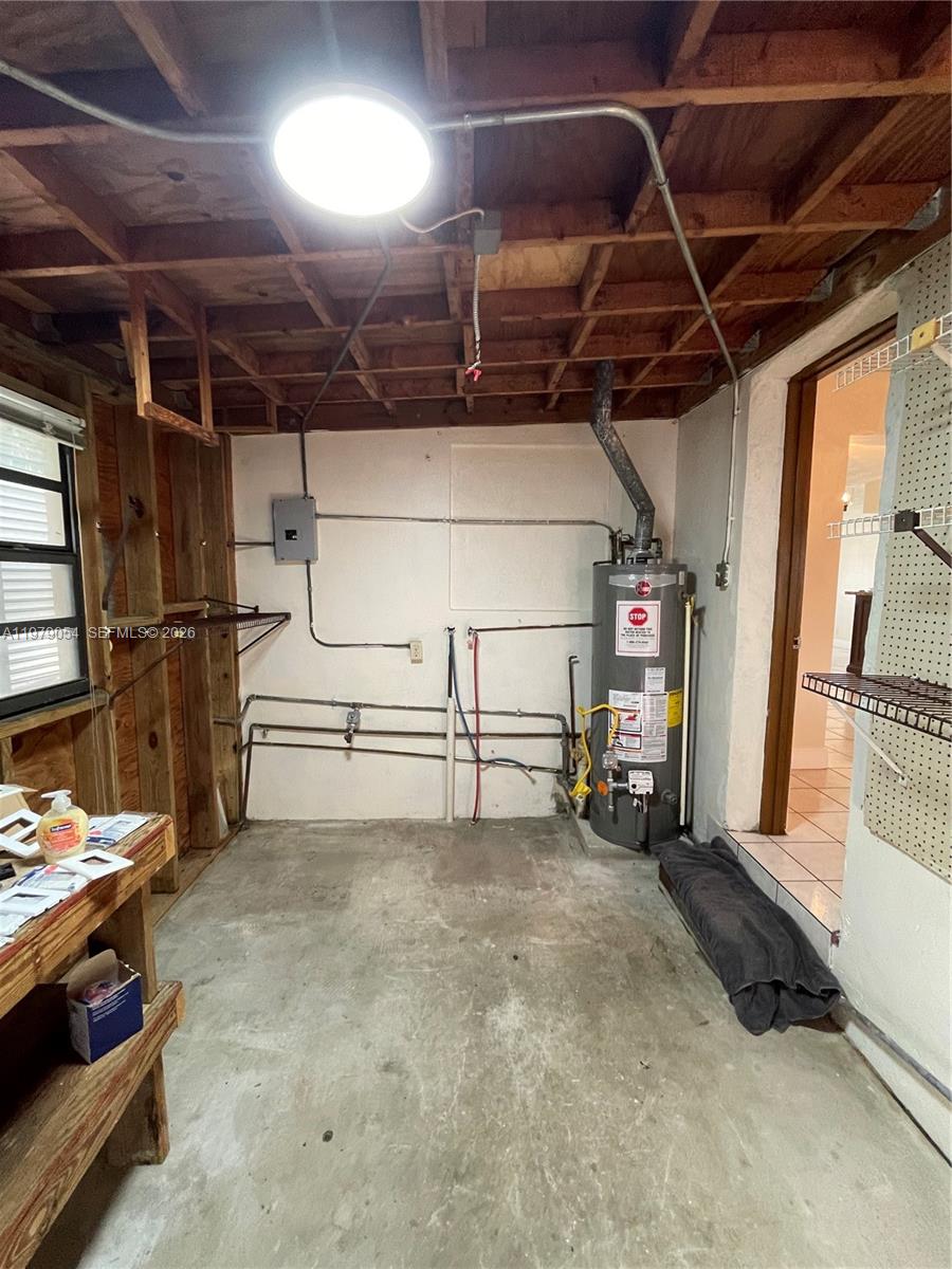 6614 Southwest 20th Street Miramar, FL 33023 - Photo 23 of 28 a view of empty room with wooden ceiling