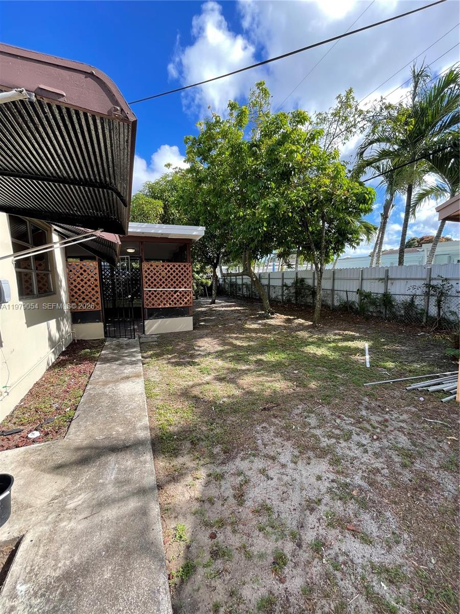 6614 Southwest 20th Street Miramar, FL 33023 - Photo 28 of 28 a view of a backyard with a large tree