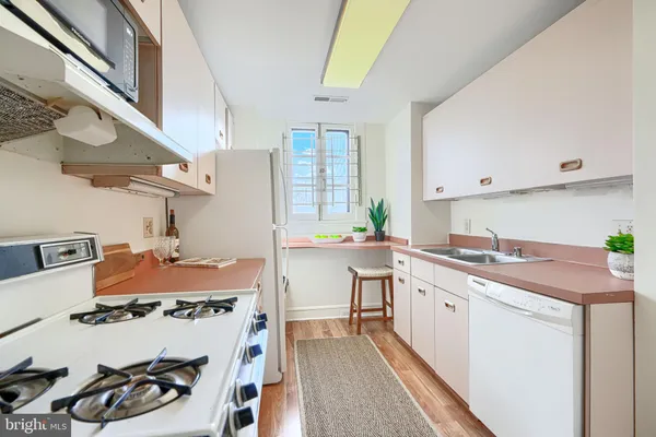 a bedroom with a bed and a chair